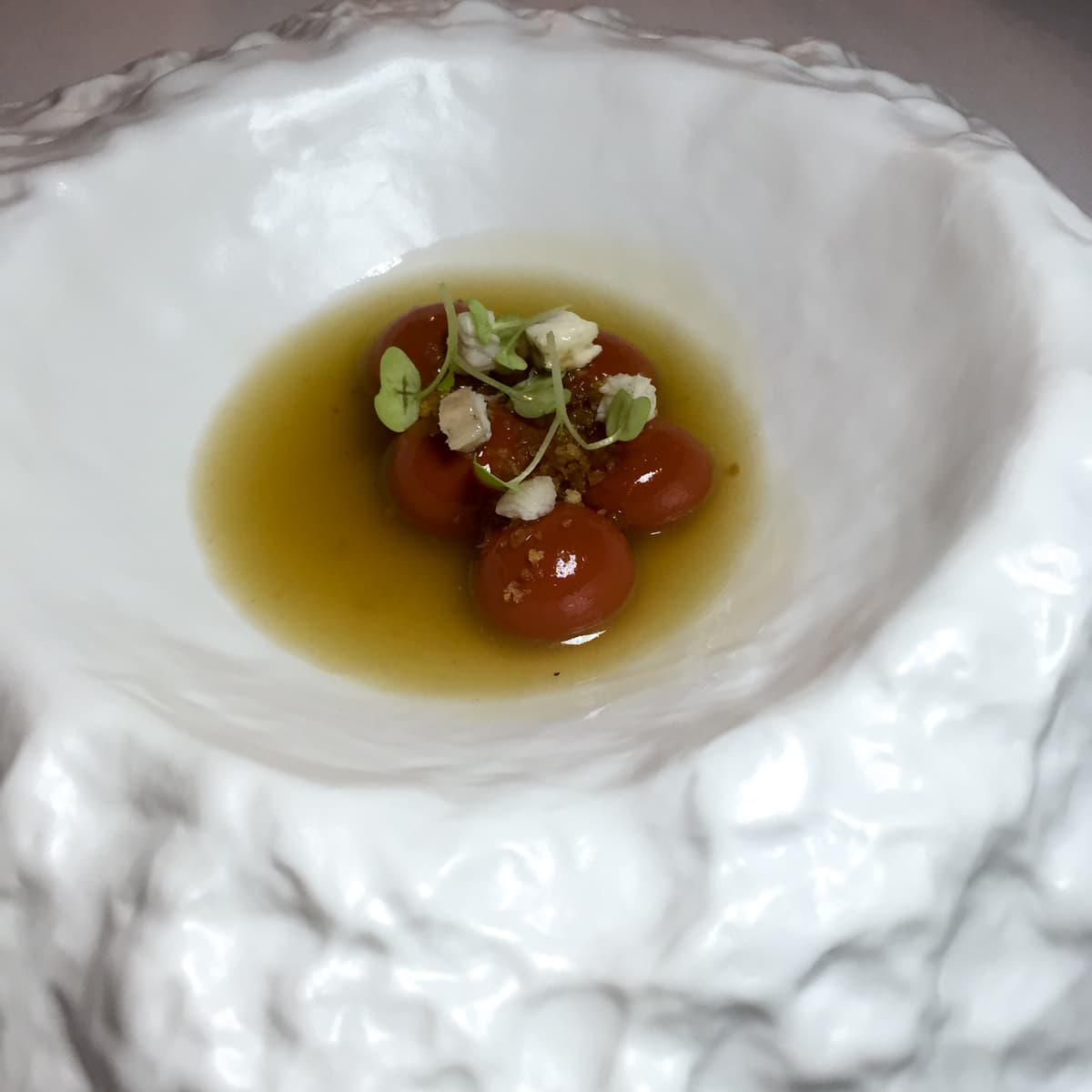 Gnocchi di annatto, brodo di patata, anguilla affumicata