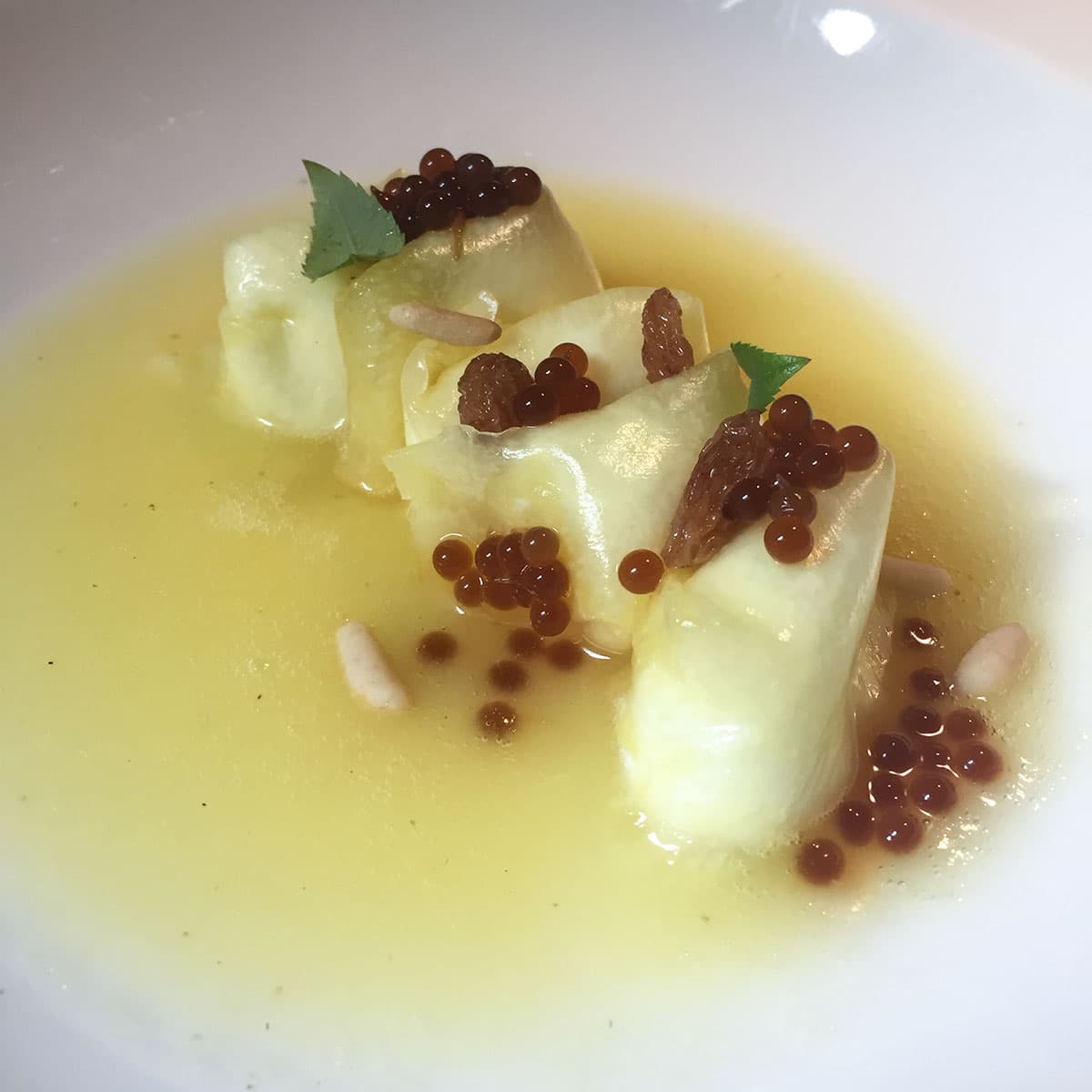 Ristorante Marconi Zuppa d ananas con ravioli di ananas uvetta pinoli e caviale di caffe sidamo