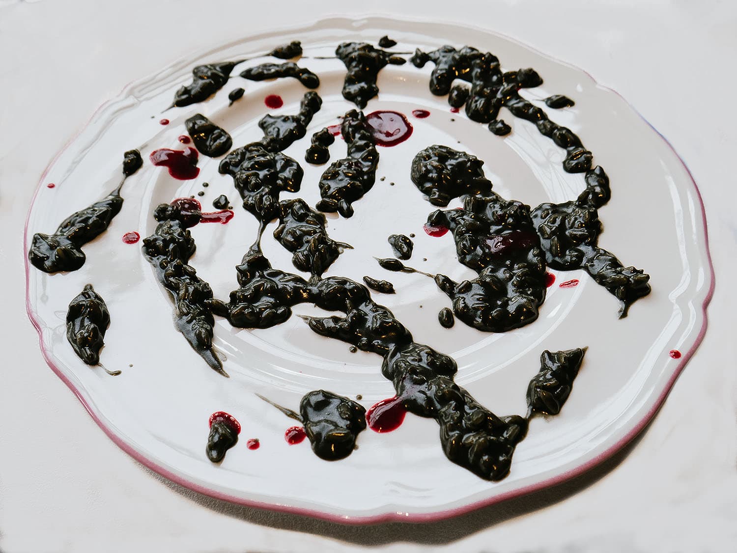 Risotto, aglio nero fermentato, frutti rossi